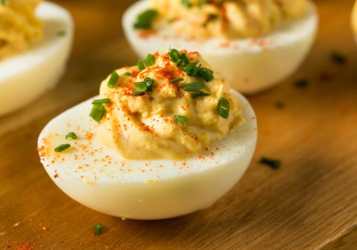 Cooked,Organic,Hard,Boiled,Eggs,With,Chives,And,Paprika deviled egg